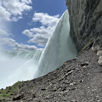 Journey Behind the Falls - The water fall  from the viewing area in journey behind the falls - Tours Near Me - Niagara Falls, Ontario