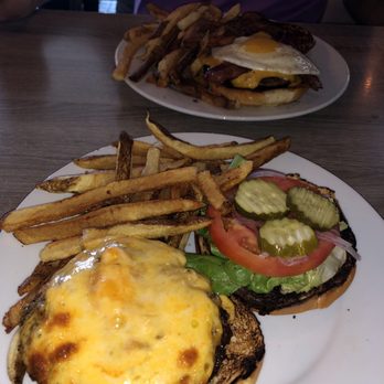 The Overpass Merchant - Breakfast burger (in back); regular burger (in front) - Gastropubs Near Me - Baton Rouge, Louisiana
