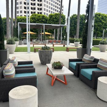 Your Marketing People - Beautiful outdoor plaza near Your Marketing People's digital marketing agency in Irvine, Orange County. Modern seating areas with palm trees - Marketing Near Me - Irvine, California Your Marketing People - Beautiful outdoor plaza near Your Marketing People's digital marketing agency in Irvine, Orange County. Modern seating areas with palm trees - Marketing Near Me - Irvine, California