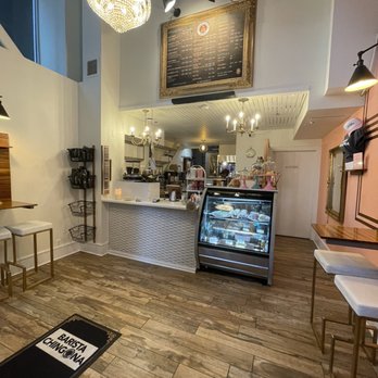 Moore Coffee Shop - Space inside has 3 small tables (2 seats each) - Coffee & Tea Near Me - Seattle, Washington