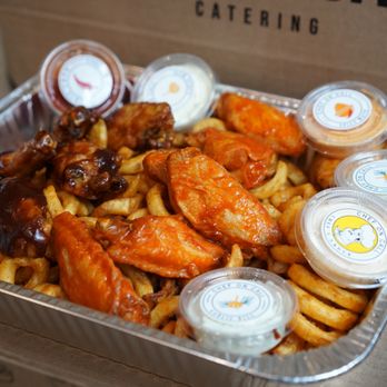 Chef on Call - This is Chef on Call's Shaker Fries & Chicken Wings in a catering box - Burgers Near Me - Montreal, Quebec