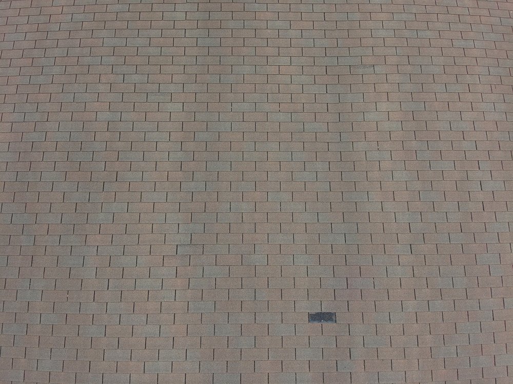 Slide of Cumming Roofing Company