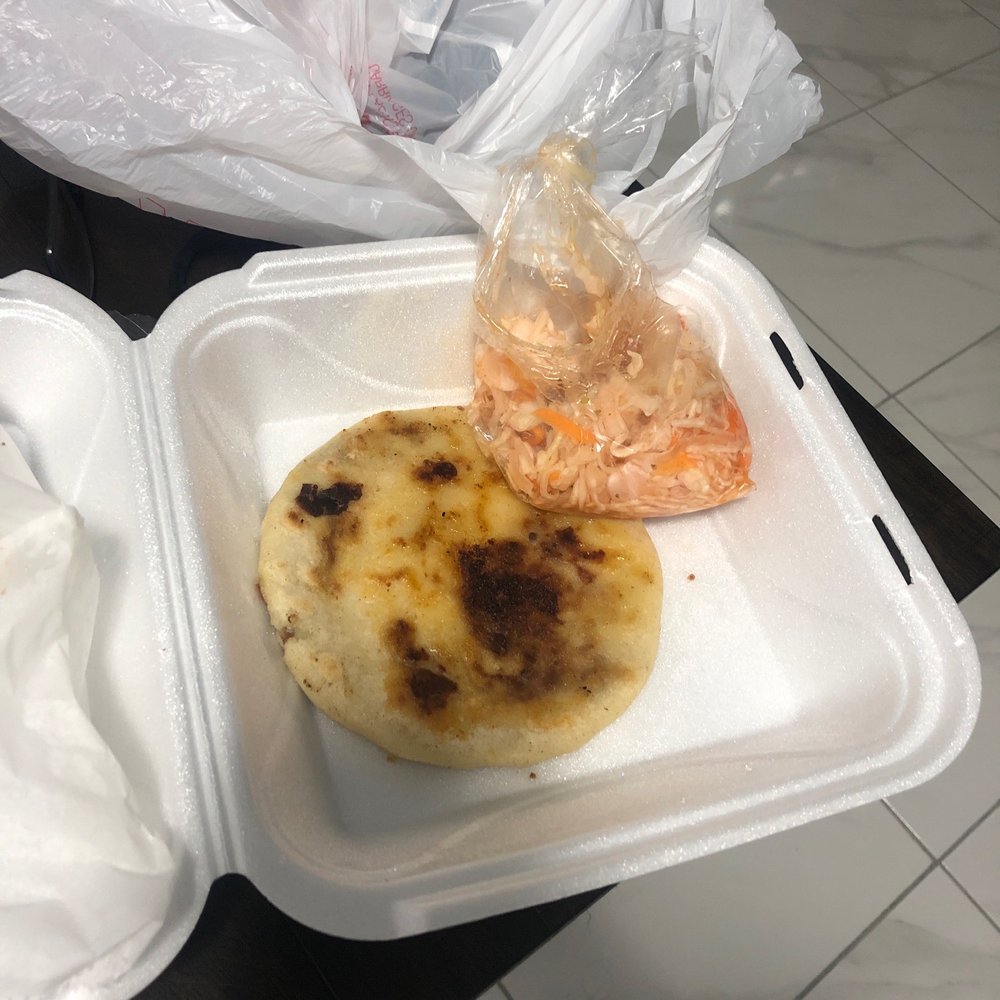 Popusa revuelta with the side of spicy cabbage it comes with Popusa revuelta with the side of spicy cabbage it comes with