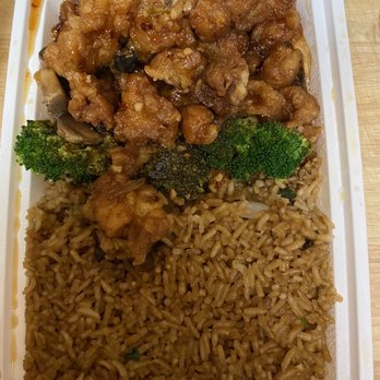 Xiang Jiang - a container of rice, broccoli, and chicken - Chinese Near Me - Cottage Grove, Wisconsin Xiang Jiang - a container of rice, broccoli, and chicken - Chinese Near Me - Cottage Grove, Wisconsin