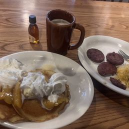 Pancakes with peach topping and whipped cream, smoked sausage , hash brown casserole and vanilla latte. Pancakes with peach topping and whipped cream, smoked sausage , hash brown casserole and vanilla latte.