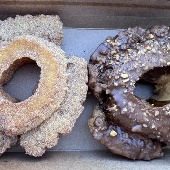 Magic Donuts & Coffee - Cinnamon sugar old fashioned (left) and chocolate hazelnut old fashioned (right) - Donuts Near Me - San Francisco, California Magic Donuts & Coffee - Cinnamon sugar old fashioned (left) and chocolate hazelnut old fashioned (right) - Donuts Near Me - San Francisco, California