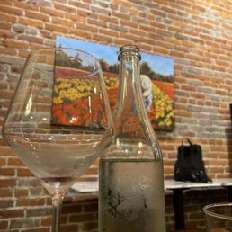 a bottle of wine and two glasses of wine a bottle of wine and two glasses of wine