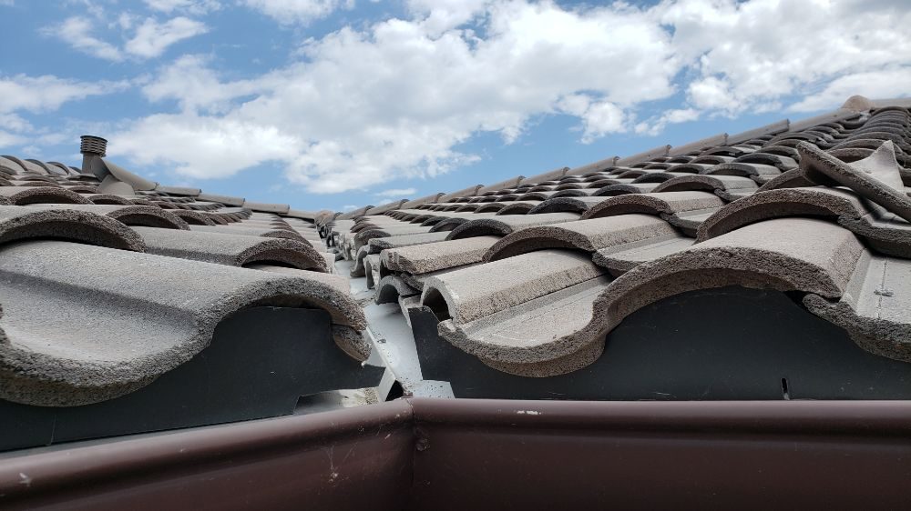 Slide of The Roofing Company