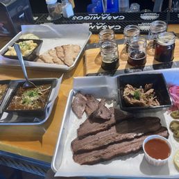 Tasting: BBq brisket, pulled pork, green chili, red chili, mac-n-cheese, beer