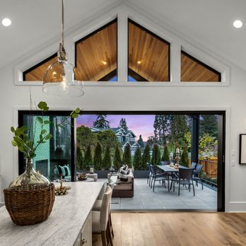 Britt Wibmer - Dramatic high ceilings and retractable wall of windows provide the perfect backdrop for year round entertaining . - Real Estate Agents Near Me - Kirkland, Washington Britt Wibmer - Dramatic high ceilings and retractable wall of windows provide the perfect backdrop for year round entertaining . - Real Estate Agents Near Me - Kirkland, Washington