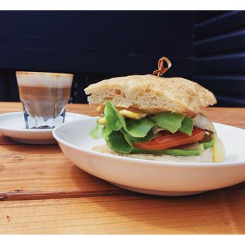 The Society Hotel - Breakfast sandwich... this is the one with avocado, greens and tomato. With a delicious cortado to drink. - Hostels Near Me - Bingen, Washington