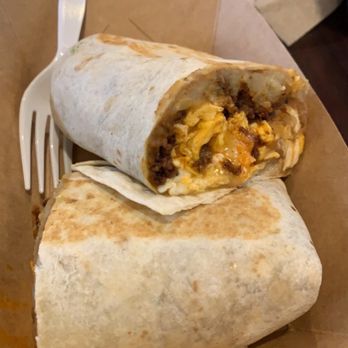 Salsa Limón - A breakfast burrito with chorizo, bean and cheese, potato, and so so yummy!! It's also big, - Breakfast & Brunch Near Me - Fort Worth, Texas Salsa Limón - A breakfast burrito with chorizo, bean and cheese, potato, and so so yummy!! It's also big, - Breakfast & Brunch Near Me - Fort Worth, Texas