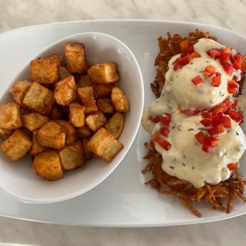 Another Broken Egg Cafe - Hash brown eggs Benedict with potatoes - Breakfast & Brunch Near Me - Panama City Beach, Florida Another Broken Egg Cafe - Hash brown eggs Benedict with potatoes - Breakfast & Brunch Near Me - Panama City Beach, Florida