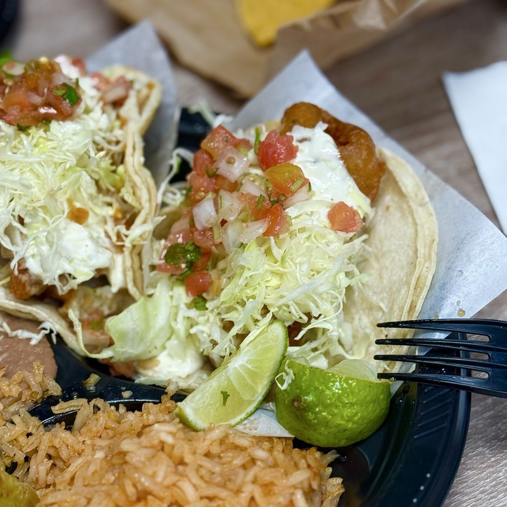 World Famous Fish Taco with rice, beans, nachos