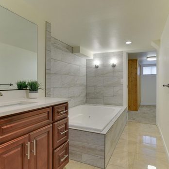 Koven Construction - a bathroom with a large tub - General Contractors Near Me Koven Construction - a bathroom with a large tub - General Contractors Near Me