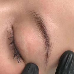 Close up look of threaded eyebrow