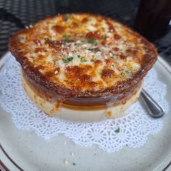 The Cove Seafood & Banquets - French Onion Soup. Very good. Not too salty. Cheese broiled just right.  Also got the seafood stuffed banana peppers. So good