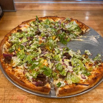 Gigi’s Pizza Co. - "Big Mac" Pizza: Burger, Pickles, Onions, Thousand Island made in-house, garnished with Lettuce - Pizza Near Me - Watertown, Massachusetts Gigi’s Pizza Co. - "Big Mac" Pizza: Burger, Pickles, Onions, Thousand Island made in-house, garnished with Lettuce - Pizza Near Me - Watertown, Massachusetts