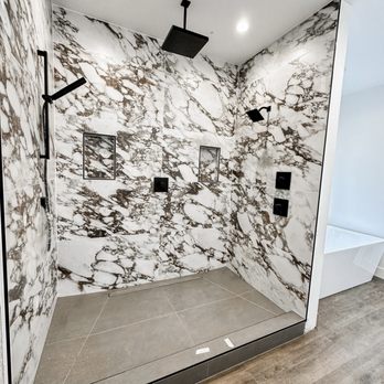 Triton Built - Custom master shower. Double niche, linear drain, large format tile everywhere - Tiling Near Me