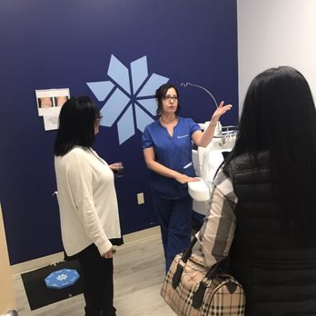 Laser MD MedSpa - Our Coolsculpting educator Charlene speaking to potential candidates at our Grand Opening party! - Medical Spas Near Me - Burlington, Massachusetts