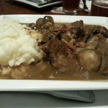 Buskers - Busker's Guiness Braised Beef with mashed potatoes - Irish Near Me - Newport, Rhode Island Buskers - Busker's Guiness Braised Beef with mashed potatoes - Irish Near Me - Newport, Rhode Island