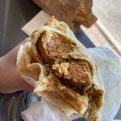 Lena's Roti And Doubles - Stewed curry chicken roti