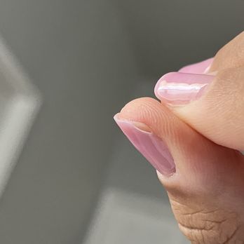 Apple Nails Lounge - Thumb nail already peeling away. Got them done 1 day ago. - Waxing Near Me - Humble, Texas Apple Nails Lounge - Thumb nail already peeling away. Got them done 1 day ago. - Waxing Near Me - Humble, Texas
