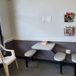 Super Suds Laundromat - Table, stool, magazines