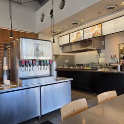 Chipotle Mexican Grill - The softdrink machine. Bring this photo in Close-up and noticed how it needs to be whipped clean. Look.also at the floor under.