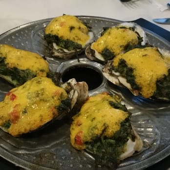 By The Docks Restaurant - Oster's  rockafeller, bloody mary, crab stuffed lobster, steak and crab cake. - Seafood Near Me - Middle River, Maryland