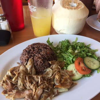 Sol Cubano - Lechon Asado with Cuban Rice, small green salad w/ light vinaigrette. Fresh Coconut Water and fresh pineapple juice after Yucca Fries - Cuban Near Me - North Highlands, California Sol Cubano - Lechon Asado with Cuban Rice, small green salad w/ light vinaigrette. Fresh Coconut Water and fresh pineapple juice after Yucca Fries - Cuban Near Me - North Highlands, California