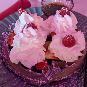 Champagne Poetry - Ube Waffle with Chantilly Crème, raspberries, and strawberries - Champagne Bars Near Me - Portland, Oregon Champagne Poetry - Ube Waffle with Chantilly Crème, raspberries, and strawberries - Champagne Bars Near Me - Portland, Oregon