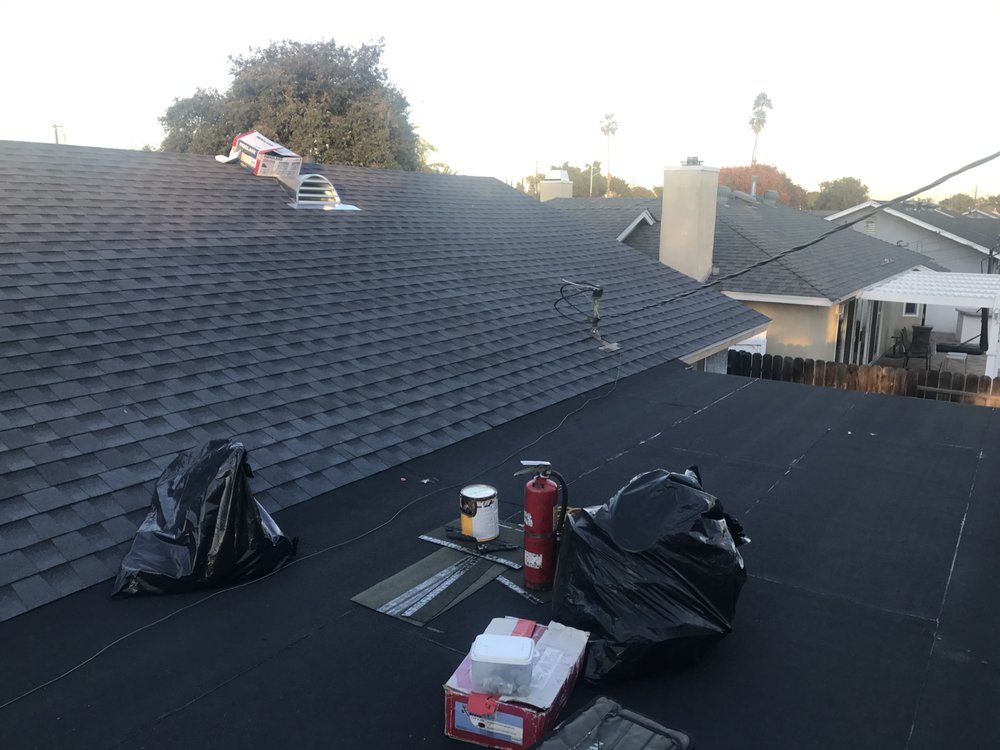 Slide of New Era Skilled Roofing