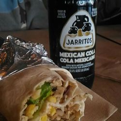 Guacamole - Vegan burrito with tofu, rice, corn, lettuce, guac and hot sauce.