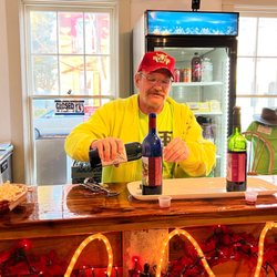 Totem Pole Wine Tasting Room - Don Hopler, owner of the Totem Pole Ranch & Winery pouring tastings.