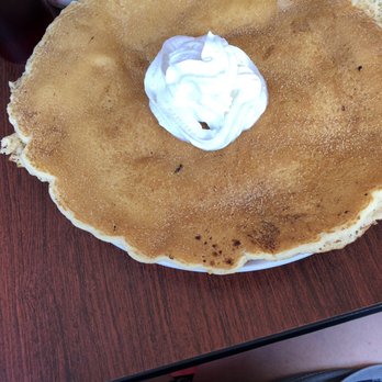Suzie Q's Breakfast Nook - Cinnamon pancake hangs over the edge of the plate! - Breakfast & Brunch Near Me - Bay City, Michigan Suzie Q's Breakfast Nook - Cinnamon pancake hangs over the edge of the plate! - Breakfast & Brunch Near Me - Bay City, Michigan