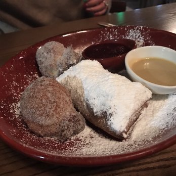 Herbe Sainte - Beignet plate. Comes with 2 donut balls with sauces. - Cajun/Creole Near Me - Omaha, Nebraska Herbe Sainte - Beignet plate. Comes with 2 donut balls with sauces. - Cajun/Creole Near Me - Omaha, Nebraska