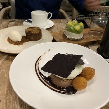 Uchi Miami - Dessert - banana cake and then ice cream with fried cream balls and a chocolatey, Oreo-like crisp topping - Asian Fusion Near Me - Miami, Florida Uchi Miami - Dessert - banana cake and then ice cream with fried cream balls and a chocolatey, Oreo-like crisp topping - Asian Fusion Near Me - Miami, Florida