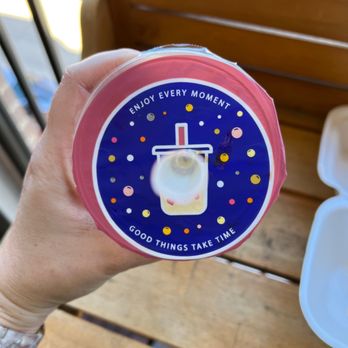 Chu Cha - a person holding a container of yogurt - Bubble Tea Near Me - Frisco, Texas Chu Cha - a person holding a container of yogurt - Bubble Tea Near Me - Frisco, Texas