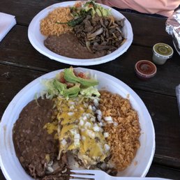 Shredded chicken enchiladas, beef fajitas