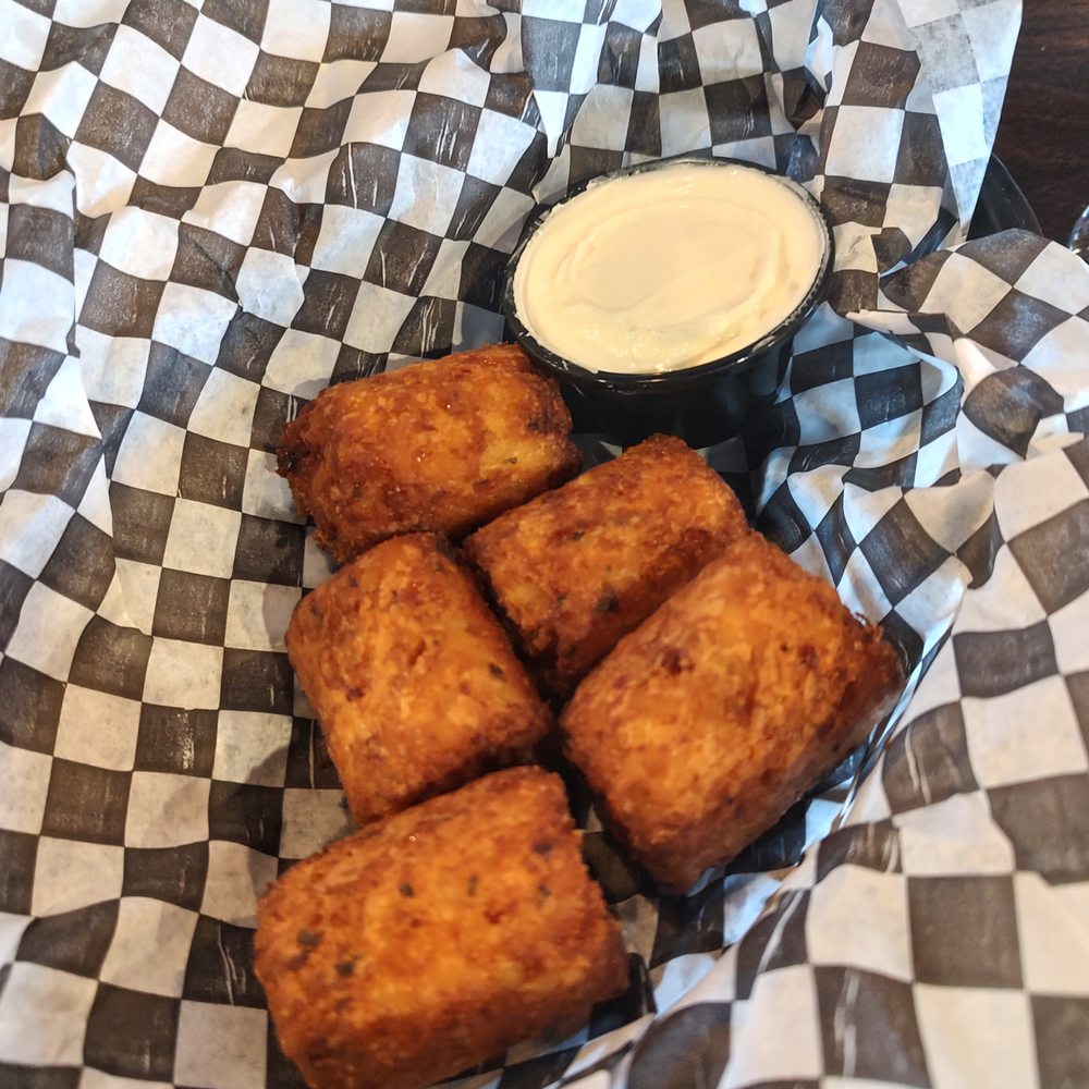 First Line Brewing - Jumbo Stuffed Tater Kegs with sour cream - Breweries Near Me - Orchard Park, New York
