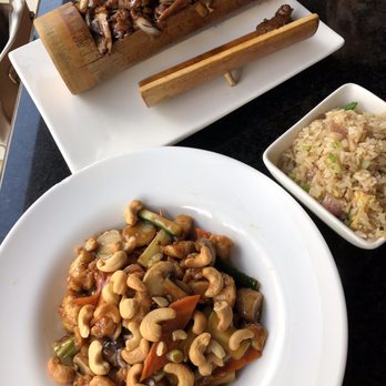 Encore Asian Bistro - Meals - cashew chicken with fried rice and beef teriyaki with fried rice underneath - Asian Fusion Near Me - Lawrence, Kansas