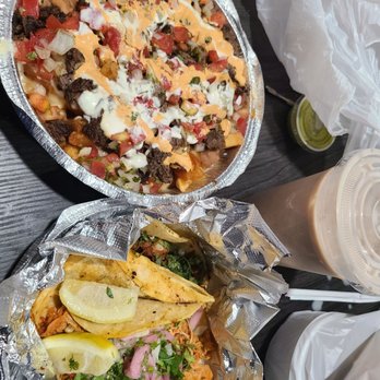 El Texano Bar and Grill - Loaded Carne asada fries , two tacos al pastor and chciken tinga - Mexican Near Me - Alexandria, Virginia El Texano Bar and Grill - Loaded Carne asada fries , two tacos al pastor and chciken tinga - Mexican Near Me - Alexandria, Virginia