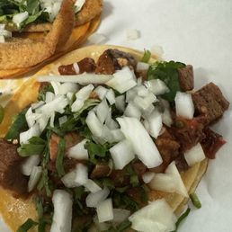 Lengua Taco (front), Fish taco (back) Lengua Taco (front), Fish taco (back)