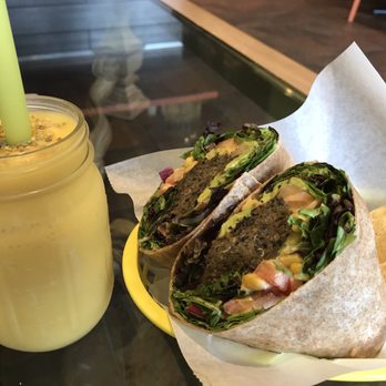 Raw Addiction Plus - Chipotle black bean wrap on whole wheat, with a mango madness smoothie. Amazing! - Vegan Near Me - Pembroke Pines, Florida Raw Addiction Plus - Chipotle black bean wrap on whole wheat, with a mango madness smoothie. Amazing! - Vegan Near Me - Pembroke Pines, Florida