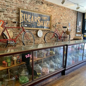 Sugar Shack - a display case with a bicycle on it - Candy Stores Near Me - Kirkwood, Missouri Sugar Shack - a display case with a bicycle on it - Candy Stores Near Me - Kirkwood, Missouri