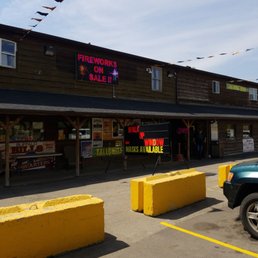a storefront and parking lot
