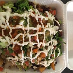 Caruthers Food & Liquors - Asada fries with everything but the Kitchen Sink. Will feed 4 with a half Torta each.