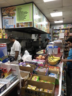 Photo of Mott Corner - New York, NY, US. The kitchen cooking up our burgers and fries!