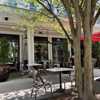 Brasserie du Soleil - Patio outside by a lake with water sounds - French Near Me - Wilmington, North Carolina Brasserie du Soleil - Patio outside by a lake with water sounds - French Near Me - Wilmington, North Carolina